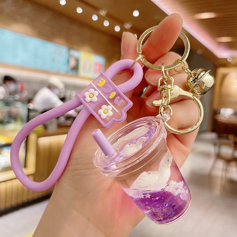 Móc Khóa Hình Thiên Nga Hoạt Hình Nổi Trên Nước Màu Tím Dễ Thương