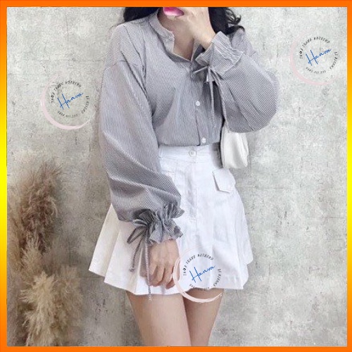 Chân Váy Ngắn Xếp Li Chất KaKi Mềm Cạp Cao Dáng Chữ A Túi Nắp Phía Trước Có Quần Trong Bảo Hộ Hanva