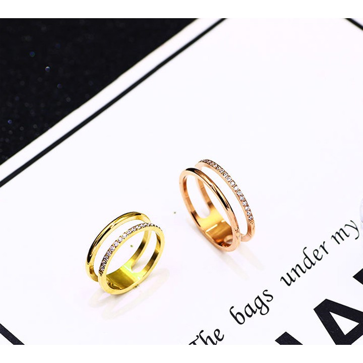 Nhẫn nữ titan cao cấp kiểu sọc đôi : 1 sọc trơn, 1 sọc đính đá siêu đẹp, bền màu, chuẩn thời trang