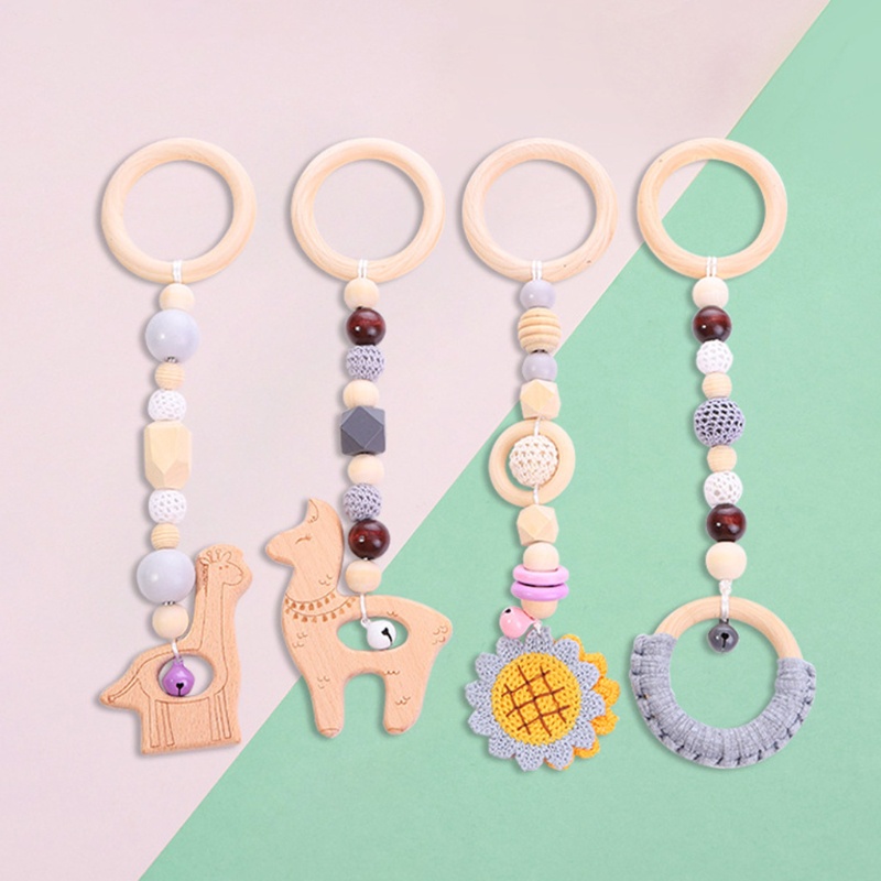 Bộ 4 Đồ Chơi Lục Lạc Treo Xe Đẩy Em Bé Tập Nhai