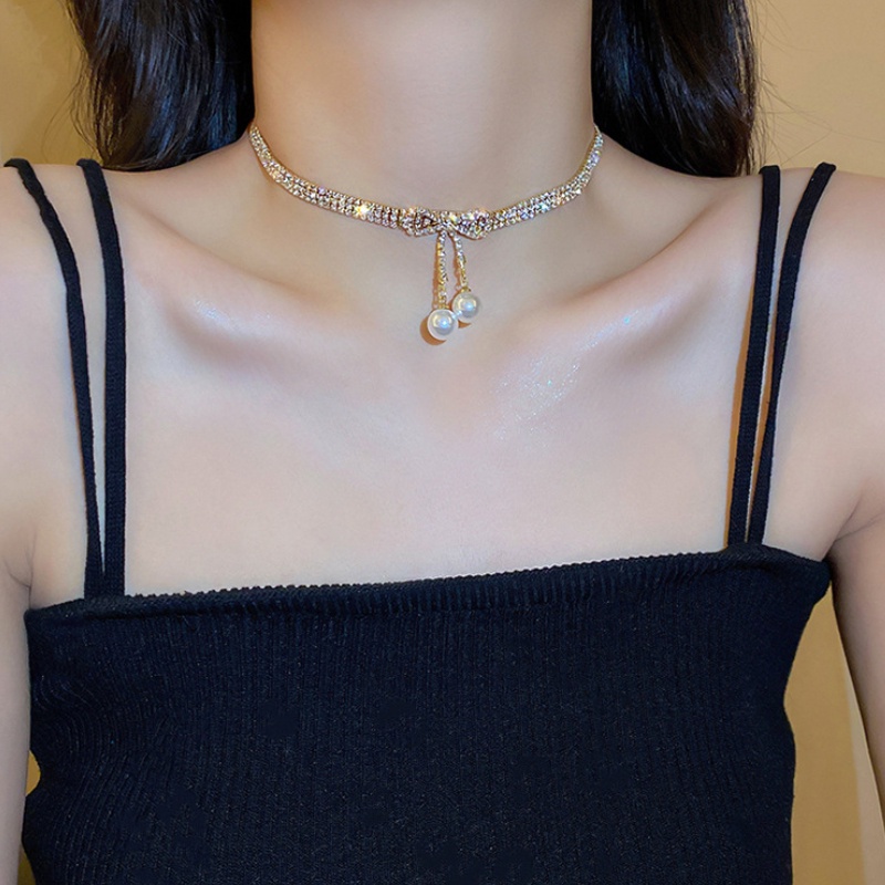 Vòng cổ Đính Đá Ngọc Trai Và Nơ Phong Cách Thời Trang Sang Trọng 2022