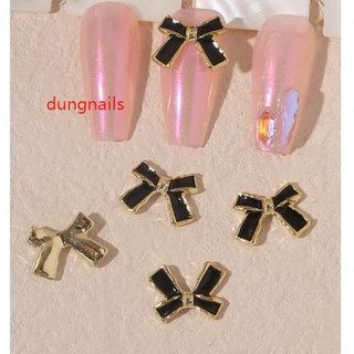 charm nơ đen trắng nail mã mới