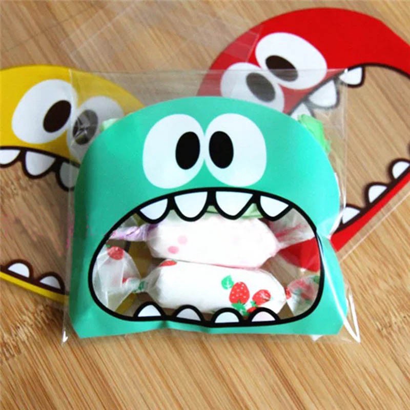 Set 100 Túi Nhựa Đựng Bánh Kẹo Houseeker 7x7cm Hình Quái Vật Có Băng Dính Dán Miệng