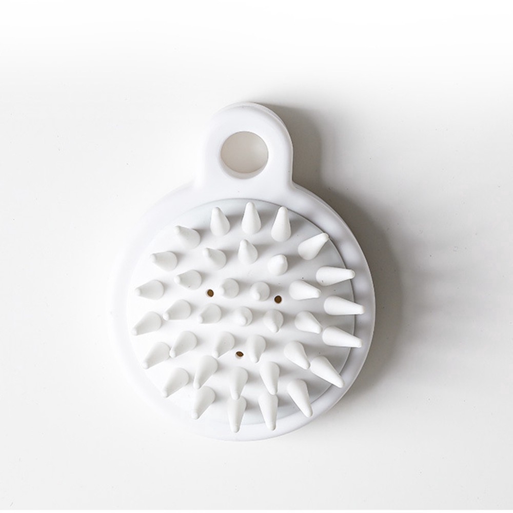 Lược mát xa da đầu mini cầm tay bằng silicon tiện dụng