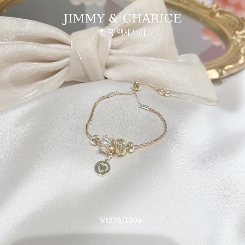 Lắc tay charm Jimmy & Charice dây rút 2 màu