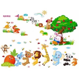 Decal dán tường thỏ ngồi gốc cây+ thỏ nhổ cà rốt