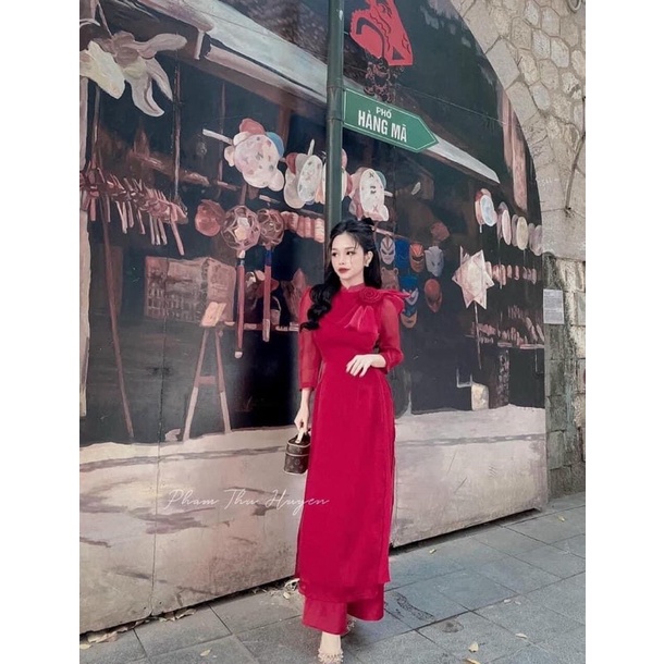Áo dài tơ óng nơ vai, chuẩn hàng hotgirl Hà Gem nơ hoa to