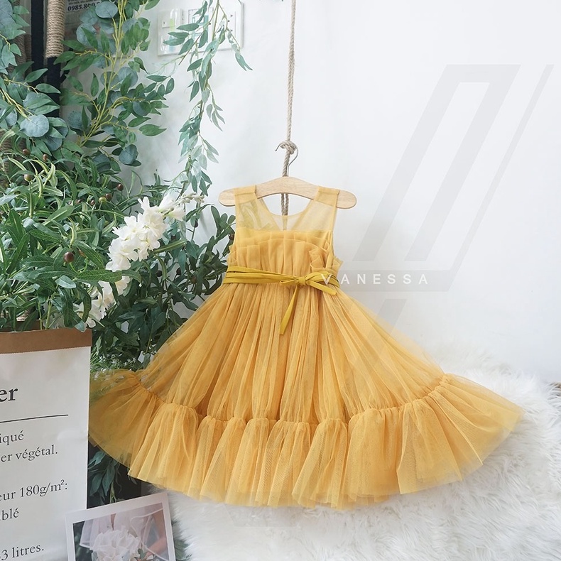 Đầm công chúa 0309v-BNDC Chất liệu: voan lưới, chất mềm, mịn, mát, không nhăn, không co giãn. Màu sắc: vàng. Form xòe