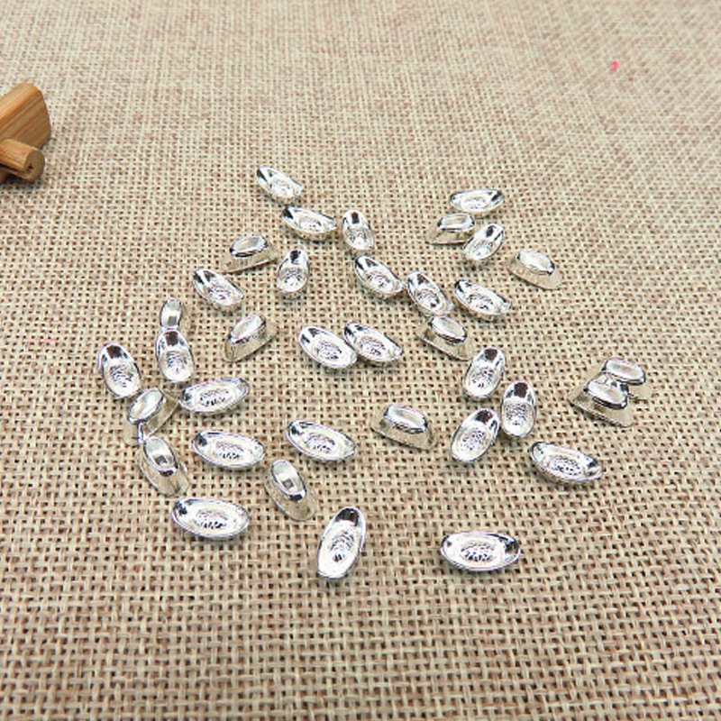 Combo 10 thỏi vàng Thần Tài kim loại size nhí 11x5x4mm