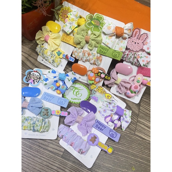 Set 9 Kẹp Tóc Hoạt Hình Đính Nơ Xinh Xắn