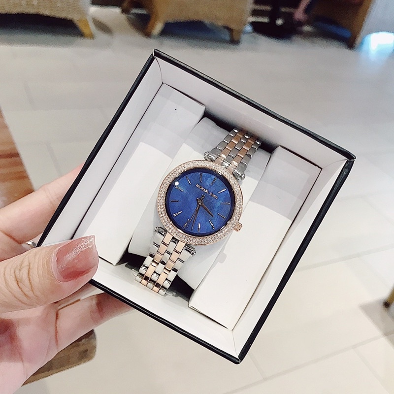 Đồng hồ nữ Michael kors .