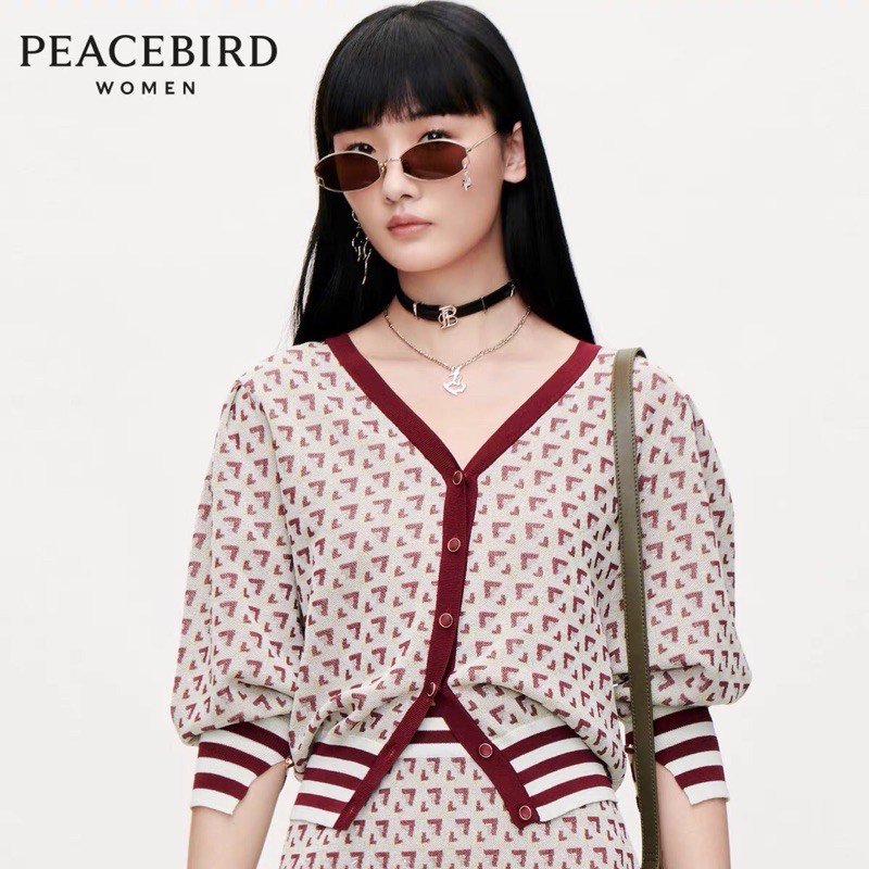 Áo len nhũ hoạ tiết Peacebird