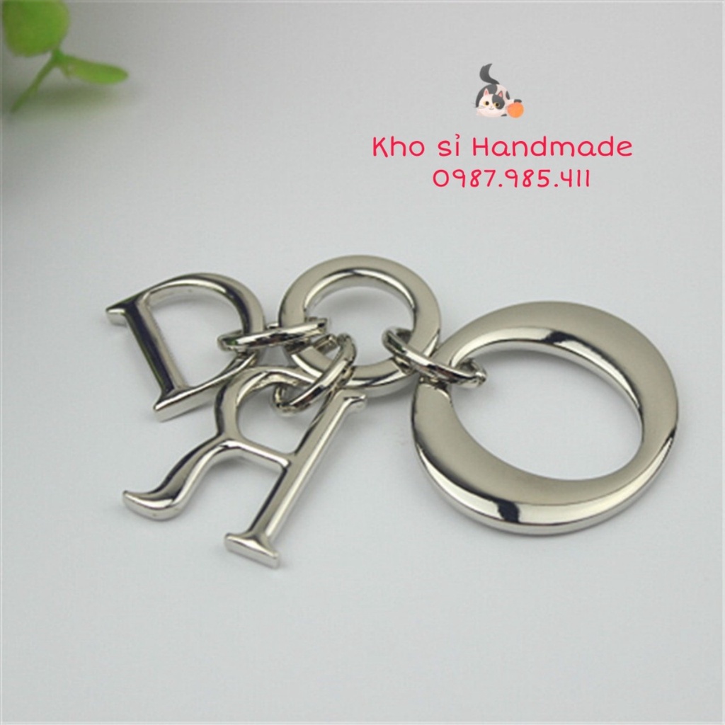 Phụ kiện gắn túi : Móc treo, chùm treo túi xách di-or