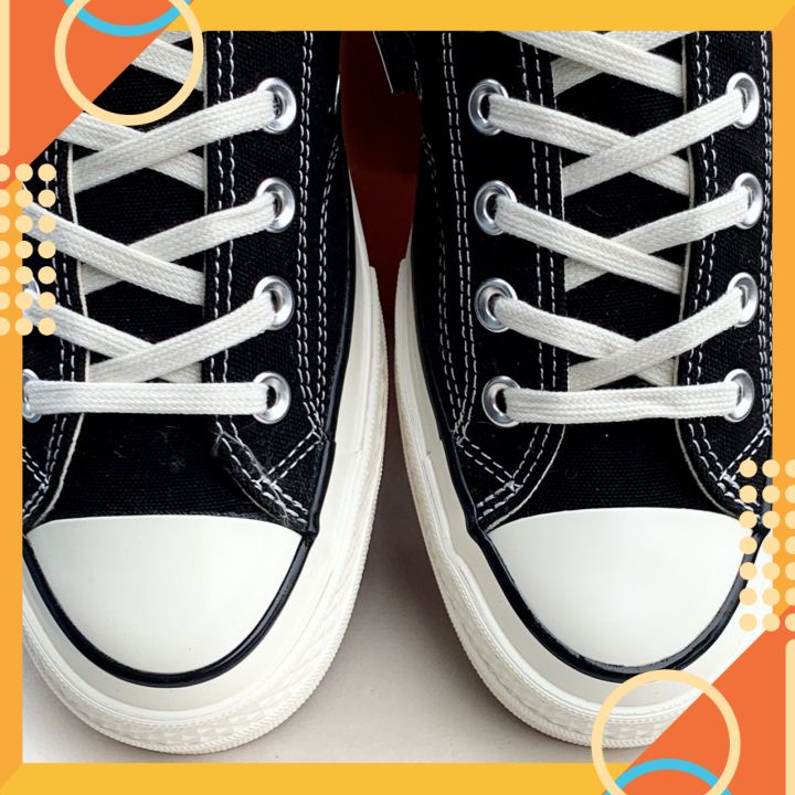 Giày đen trắng cao thấp cho nam nữ