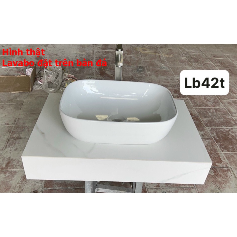 Chậu rửa mặt lavabo Đặt Bàn Đá LA42 OVAN TRẮNG, men NANO trắng sáng chống ố chống bám bẩn, la này vòi để ngoài chậu
