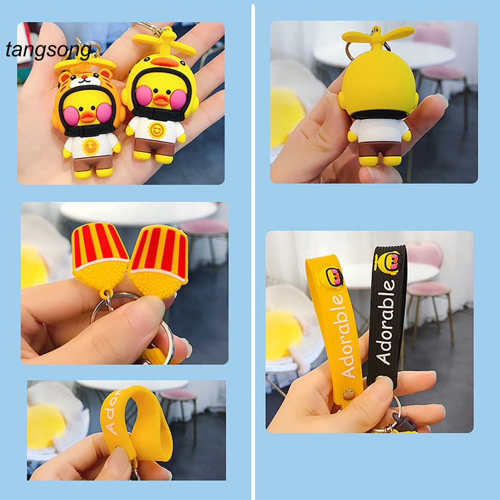 Móc khóa hình chú vịt đội mũ bảo hiểm nhỏ xinh đáng yêu