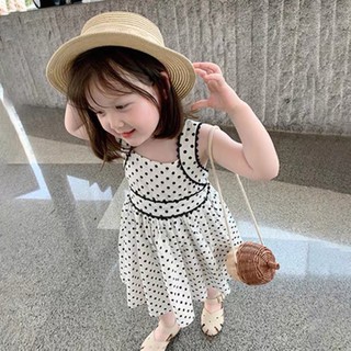 Váy chấm bi viền đen bé gái
