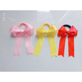 Cột tóc nơ satin xinh xắn cho bé