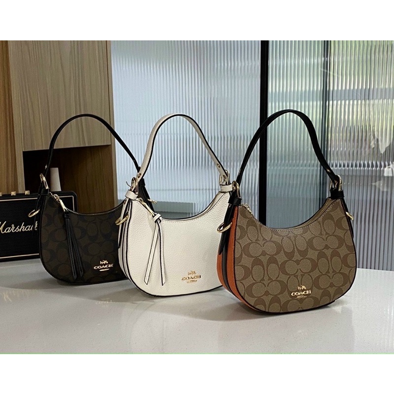 Túi Coach dáng thuyền