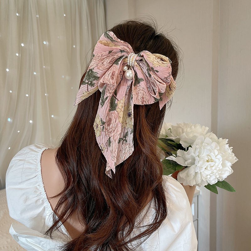 Kẹp tóc hình nơ đính hạt ngọc trai phong cách Hàn Quốc