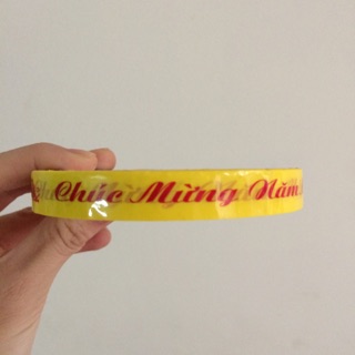 Keo Chúc mừng năm mới màu vàng