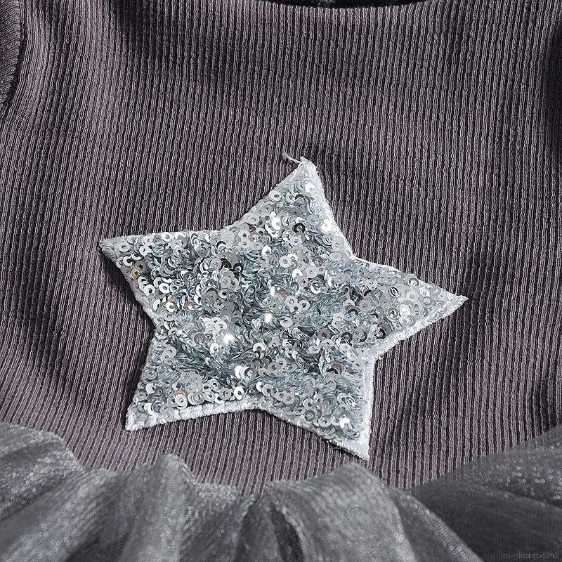 Đầm bé gái tay dài phối lưới họa tiết ngôi sao