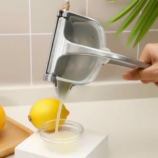 Dụng cụ ép hoa quả bằng tay