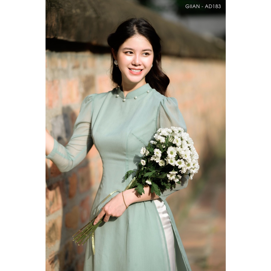 Áo dài tơ đính cổ ngọc