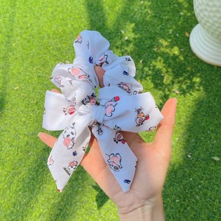 Cột tóc scrunchies charm , nơ bò sữa dễ thương