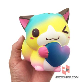 Đồ chơi squishy mèo ôm trái tim màu cầu vồng