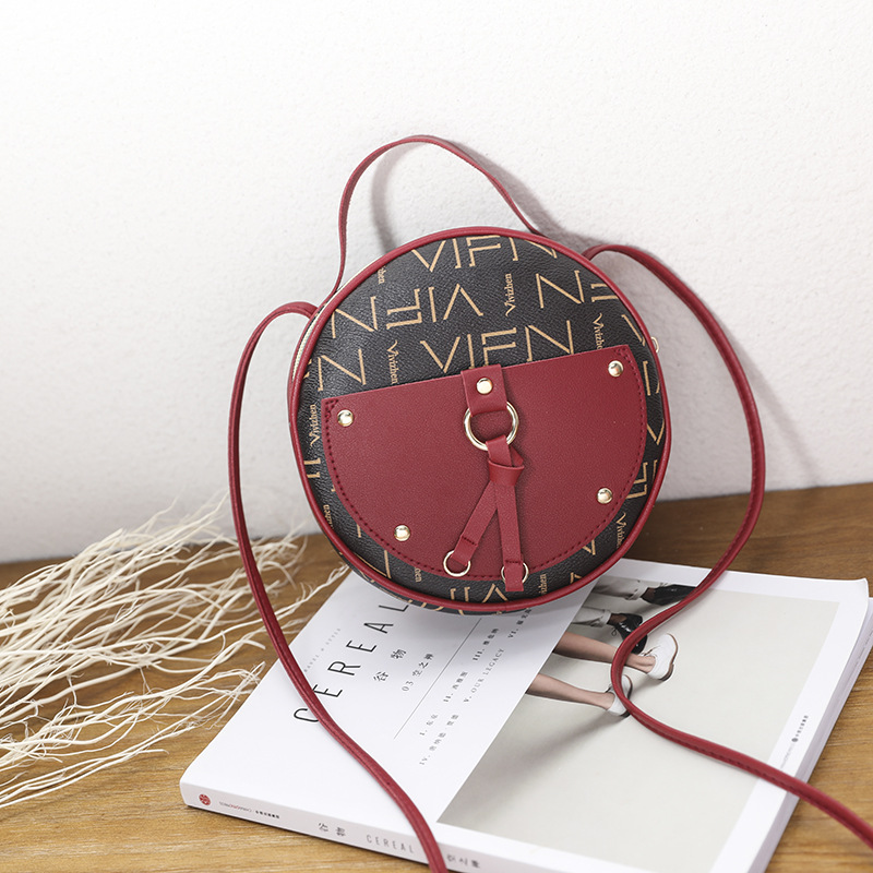 Túi đeo chéo dáng tròn nhỏ sành điệu cho nữ IELGY