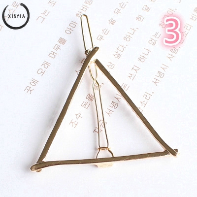 Kẹp tóc hình tam giác màu vàng