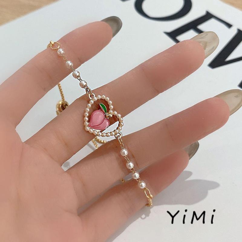 Vòng Tay Chuỗi Hạt Ngọc Trai Mặt Hình Trái Tim Màu Hồng Ngọt Ngào Cho Nữ