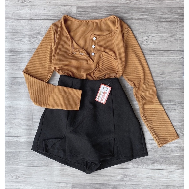 Áo gân tay dài 1 túi gài nút