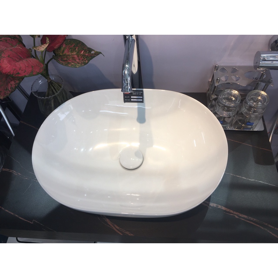 Xiphong thoát chậu lavabo dầu nhấn đầu sứ cho chậu lavabo