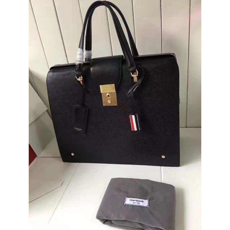 túi xách tay thời trang nam đế vuông cạnh khoá mạ vàng kim loại thom browne