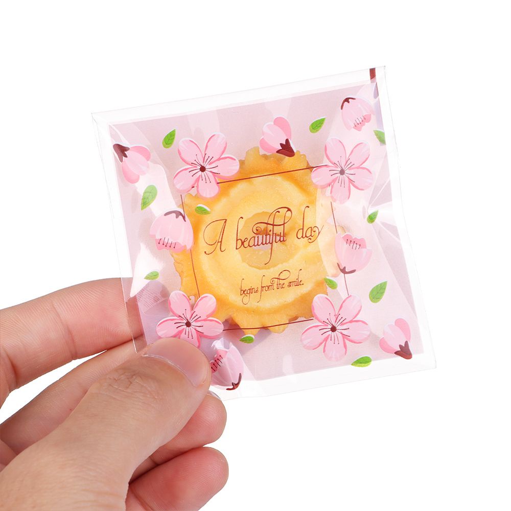 Set 100 túi nhựa OPP tự dính 7x7cm đựng bánh kẹo họa tiết hoạt hình dễ thương