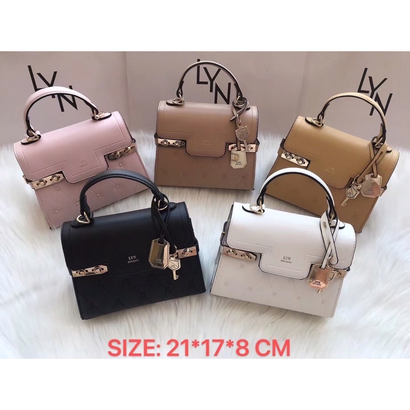 Túi L.Y.N quai cầm ô trám sz21cm