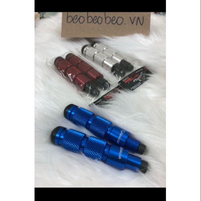 Gù chống đỗ xe máy
