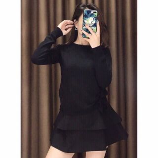 Áo thun gân tay dài thắc mắt nơ