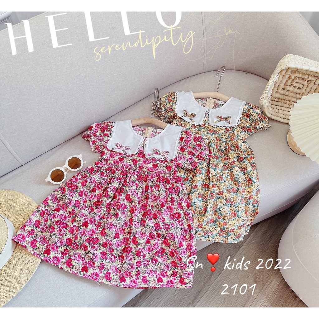 Váy babydoll hoa nhí dáng xòe cổ vuông bèo trắng 2 nơ 2 bên cổ cho bé