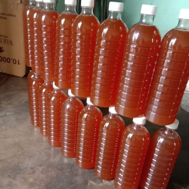 Mật ong Daklak chai 1 lít đặc sánh bao test ( ong ăn hoa tự nhiên )