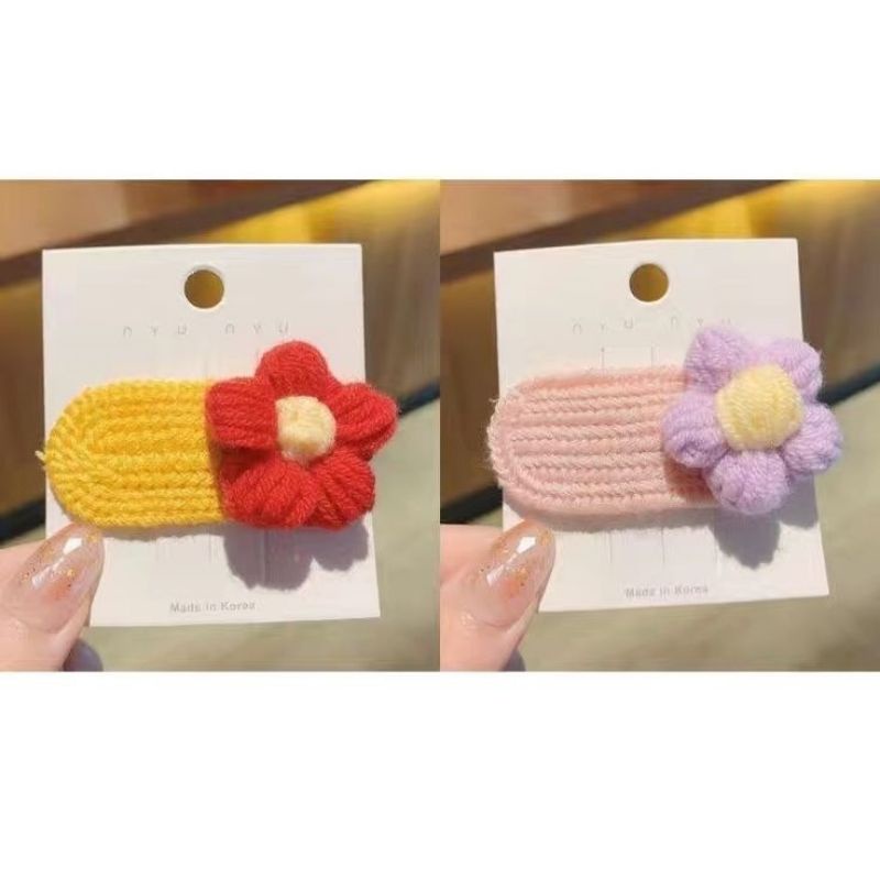 Kẹp tóc len hình bông hoa
