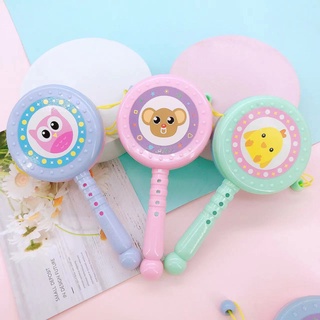 Trống đồ chơi dễ thương cầm tay cho bé - Trống bỏi lắc tay bằng nhựa - Thư Viện Đồ Chơi