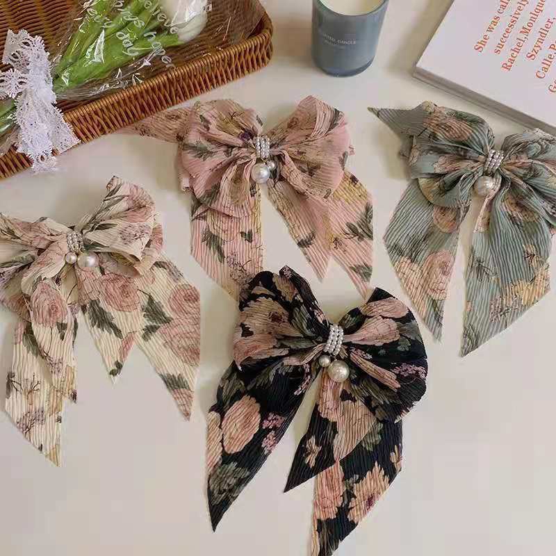 Kẹp tóc hình nơ đính ngọc trai giả bằng thép làm thủ công cho nữ