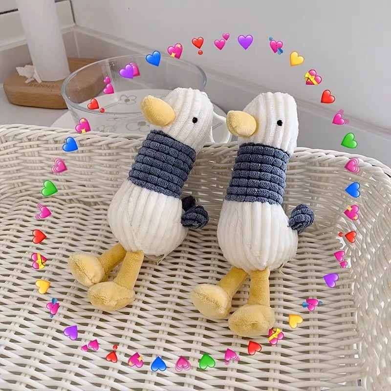 Móc khóa hình chú vịt xấu xí nhồi bông xinh xắn gắn túi xách/chìa khóa xe hơi