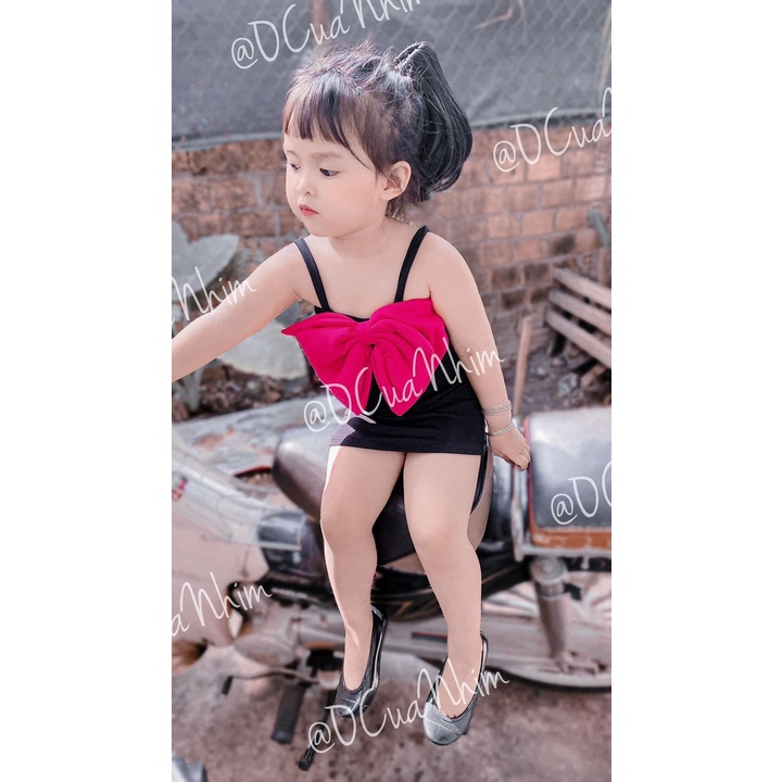 Váy body đen nơ hồng bé gái