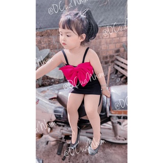 Váy body đen nơ hồng bé gái