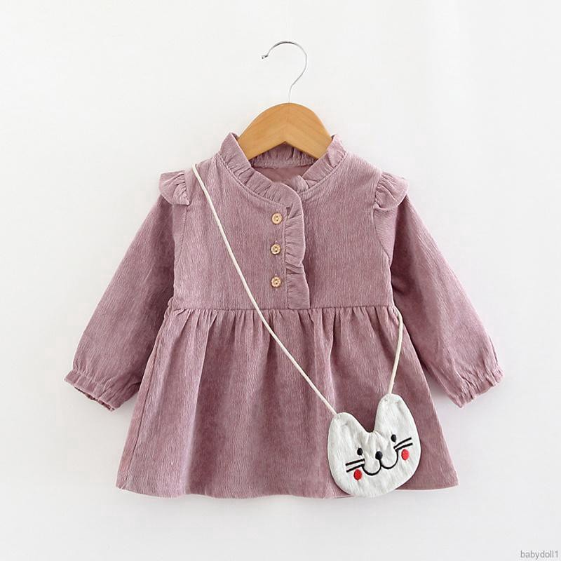 Đầm thun dài tay màu trơn kèm túi đeo chéo thời trang cho bé