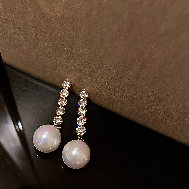 Khuyên tai tua rua dáng dài đính đá ngọc trai độc đáo